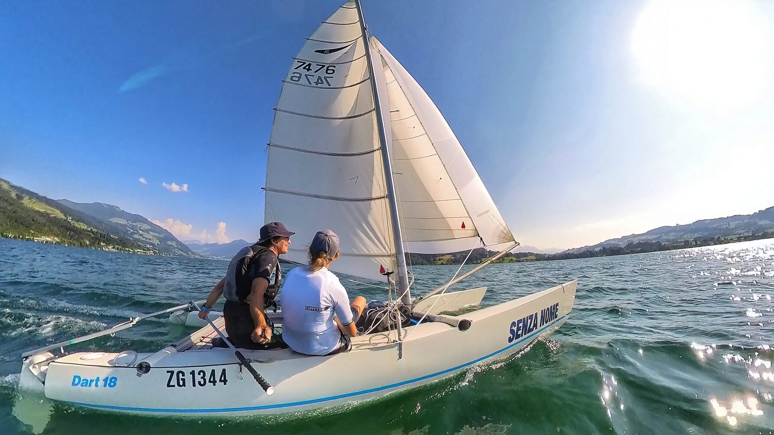 Dart 18 Catamaran sailing an efficient angle to the wind to maximize Velocity Made Good (VMG) rather than sailing a direct line.