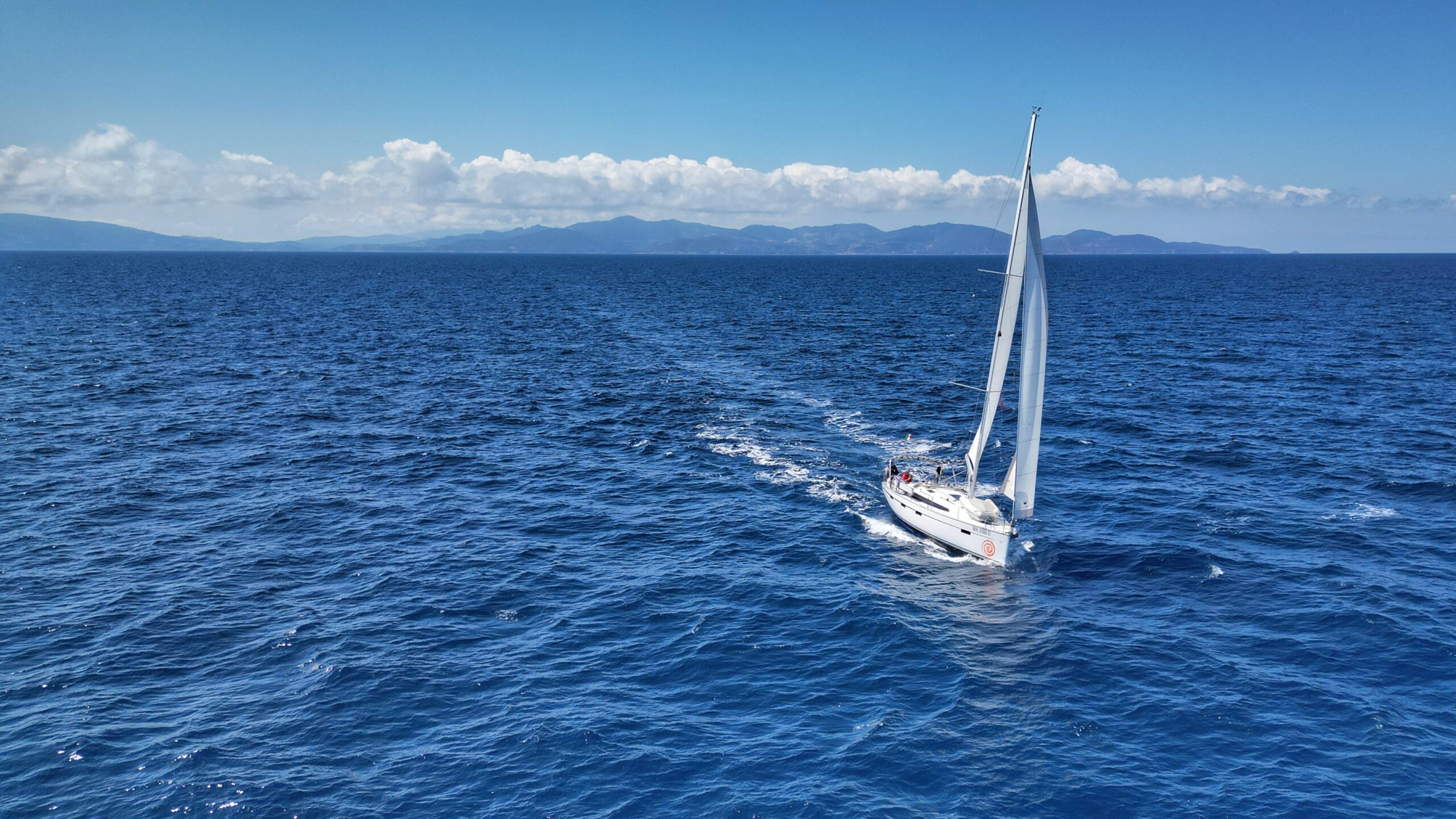 Sails act as an engine, not just a wind-catcher. These sails are set for the Apparent Wind to generate maximum lift.