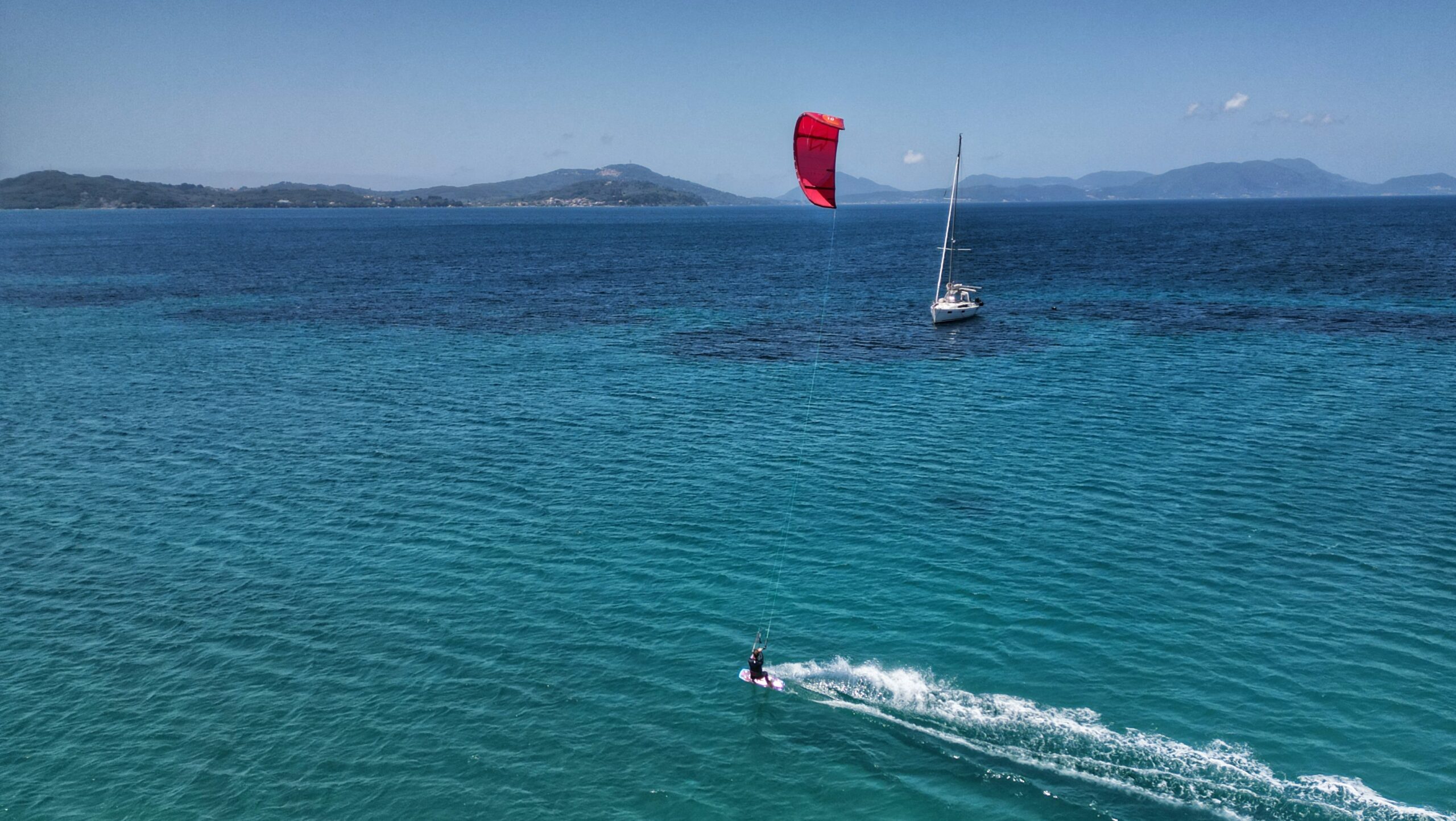 Kitesurfing from a sailboat