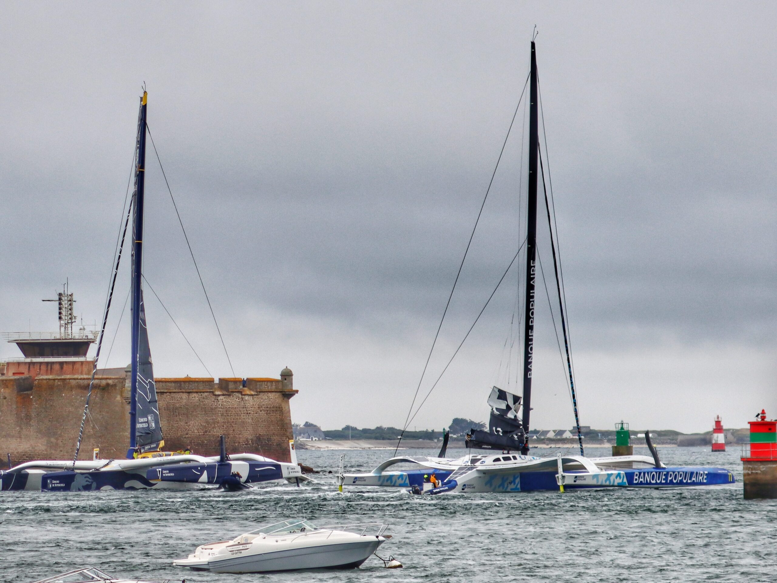 Offshore racing yachts (Ultims) at Lorient La Base in Brittany France charter