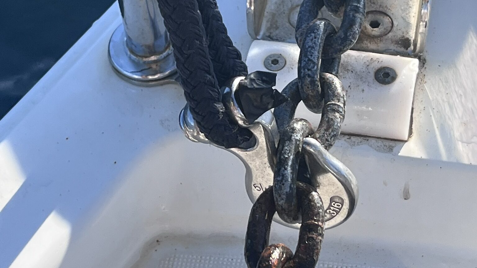 Chain hook attached to the anchor chain as a snubber