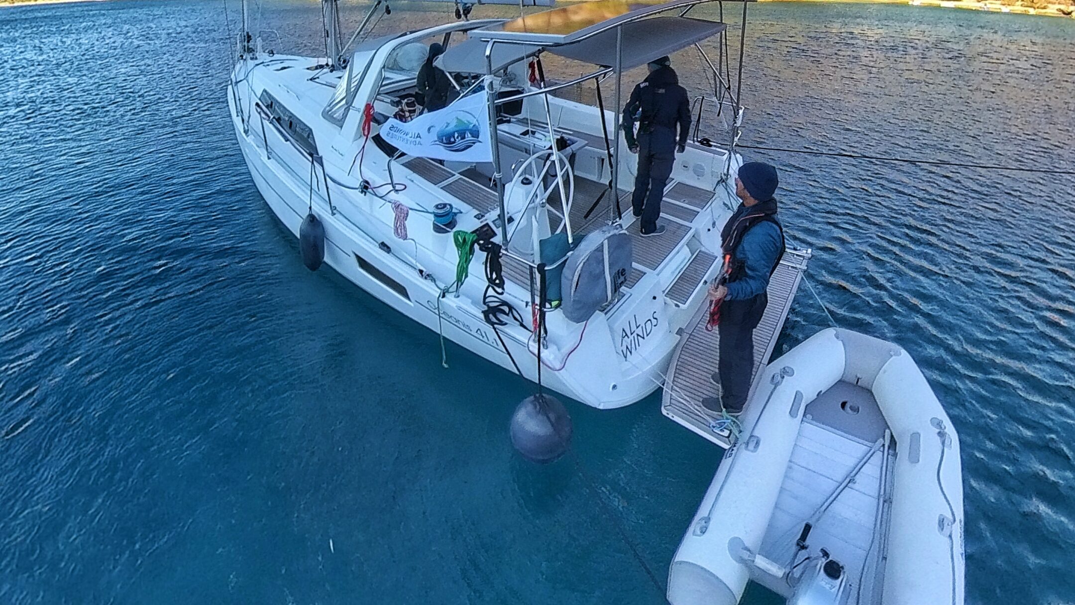 All Winds shoretied safely in a turquoise bay. 